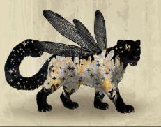 A custom Snow Leopard puma named 'Sunforged Whisper ✴'